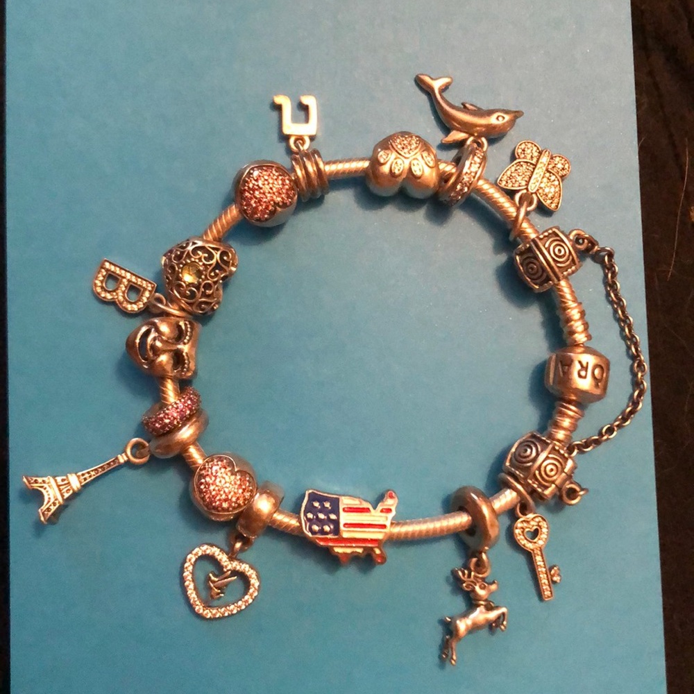 Pandora charm bracelet *16 charms* (offers open)